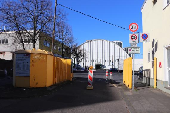 Photo of a driveway with a barrier.
