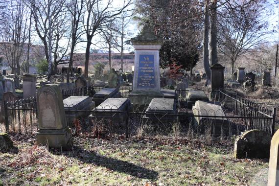 Several tombstones placed next to each other.