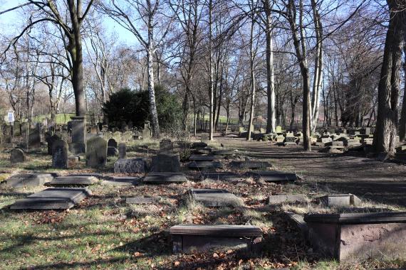 Several tombstones placed next to each other.