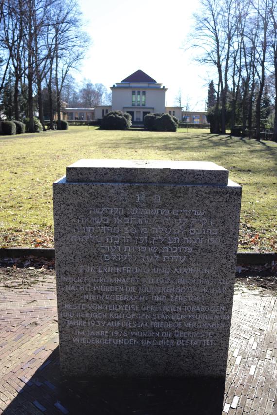 Square stone base with inscription