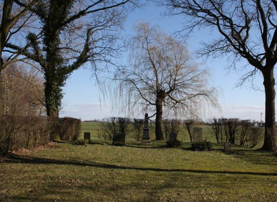 View from the street to the 6 gravestones of the cemetery.