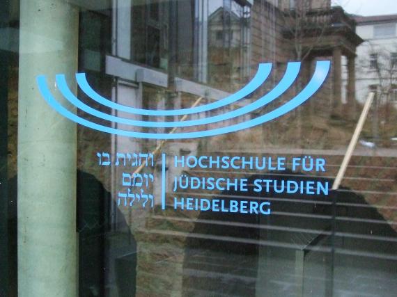 The logo consists of three arcs open upwards, one above the other