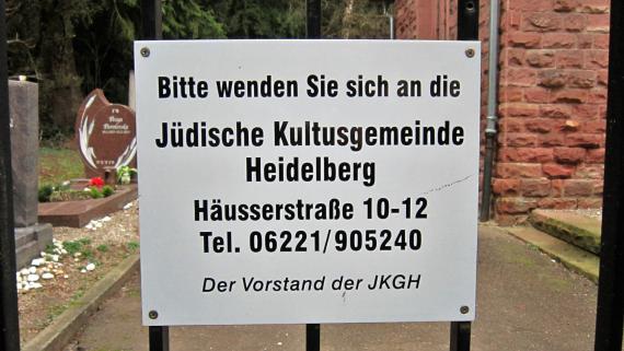 Signboard with contact details of the cemetery