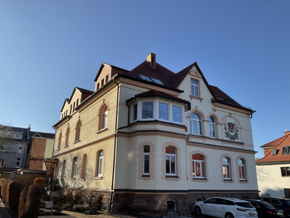 Photography of orange three-storey residential building