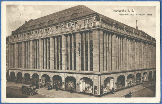 Old picture postcard from Karlsruhe with the " Hermann Tietz business house " - sent as field mail in November 1915