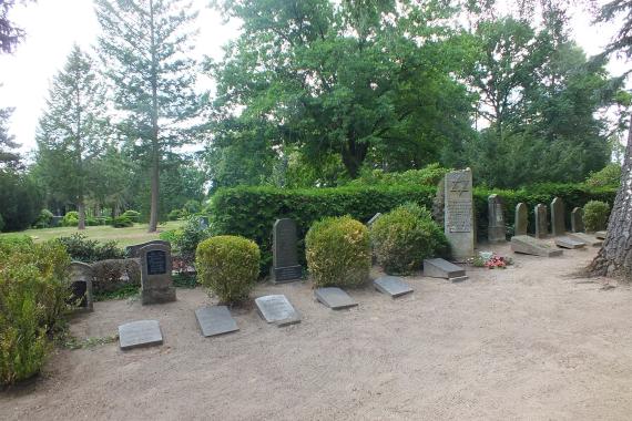 Individual gravestones in the cemetery