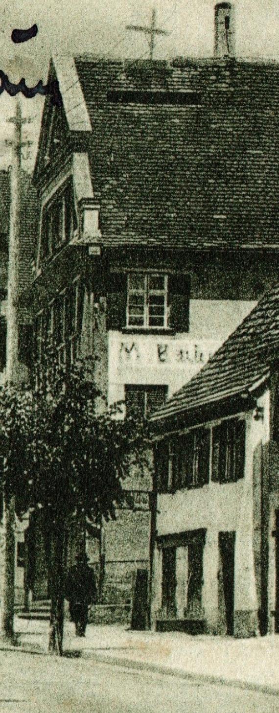 Alte Ansichtskarte von Laupheim mit der Kapellenstraße aus dem Jahr 1930 - Wohn-und Geschäftshaus Max Bach - Ausschnittvergrößerung Seitenansicht