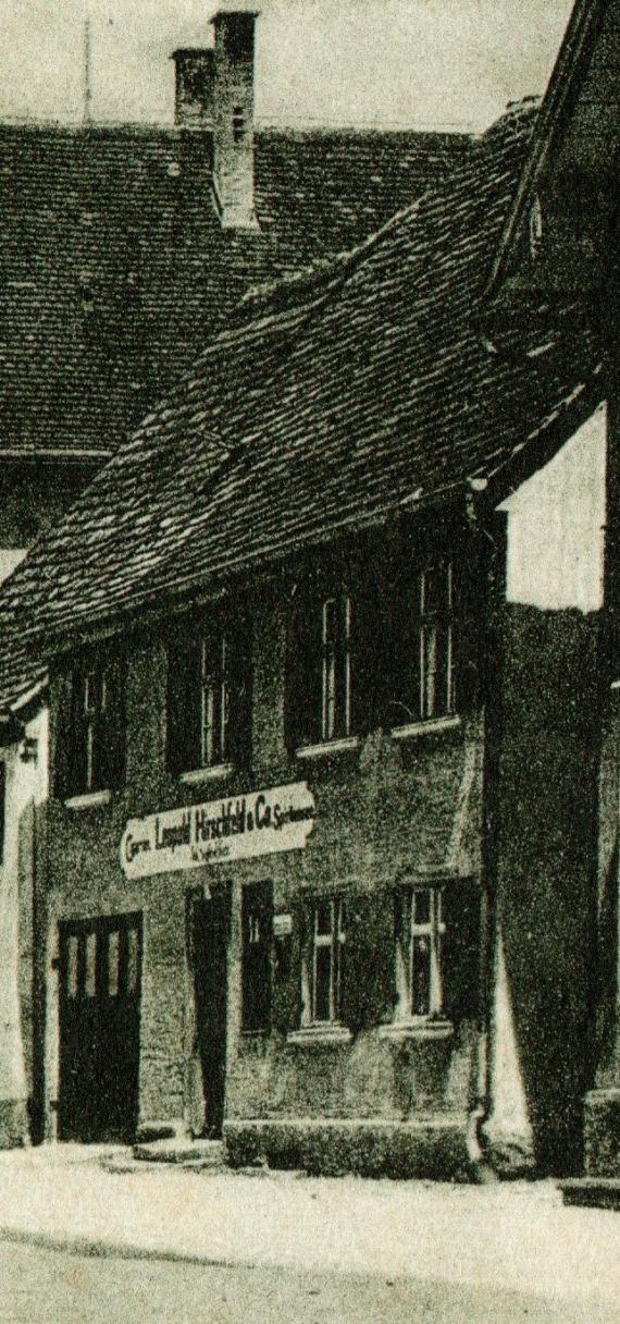 Ansichtskarte Laupheim mit der Kapellenstraße - versandt am 15. Januar 1930 - Ausschnittvergrößerung Wohnhaus- und Geschäft L. Hirschfeld & Co