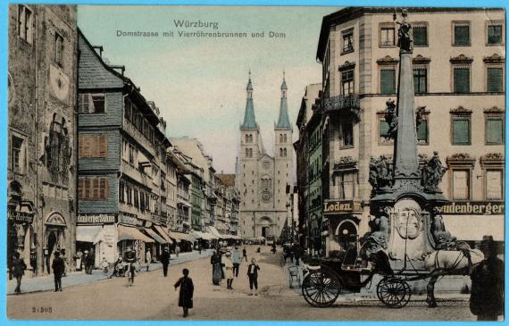 Historical picture postcard Wuerzburg - Domstrasse with four-tube fountain and cathedral and the textile and ladies' clothing store N. Freudenberger Söhne - from around 1906