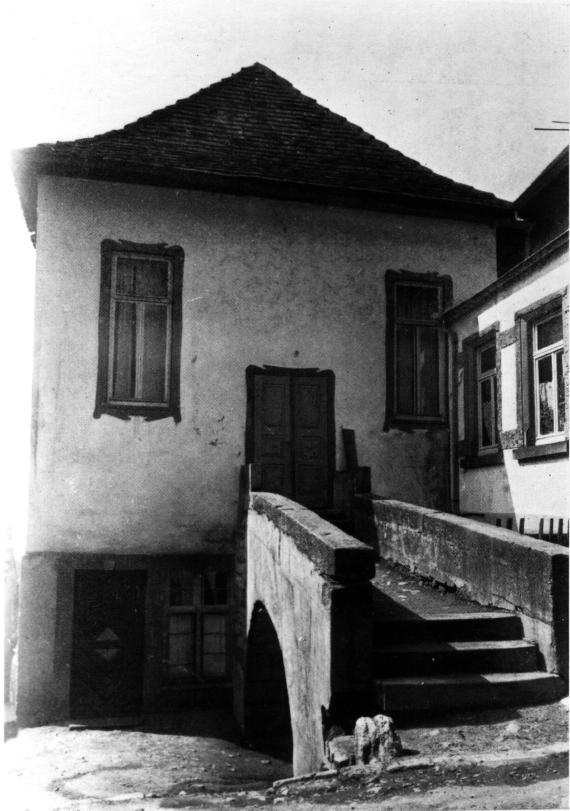 Pictured is the synagogue building with the bridge leading to it