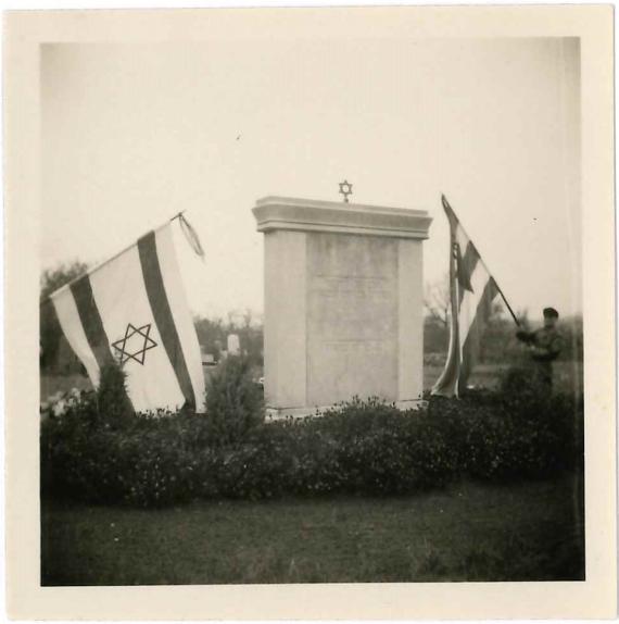 Memorial stone with flags