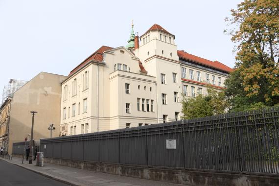 School building with fence in front