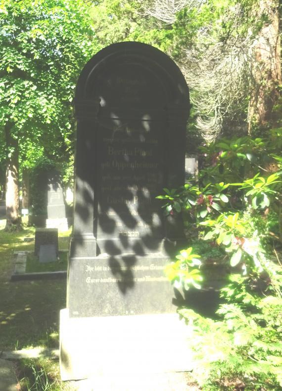 The picture shows an old gravestone.
