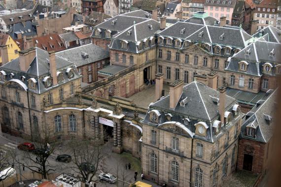 Color photograph with an aerial view of a palace