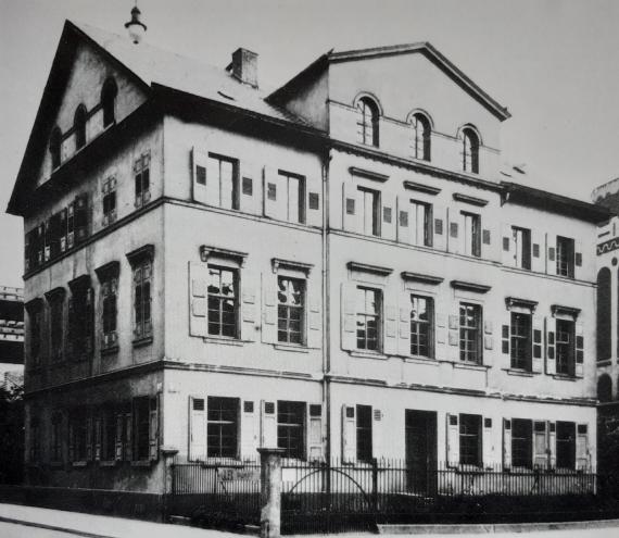 Black and white picture of a house. Side view.