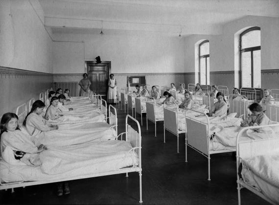 Black and white picture. A girl's dormitory.