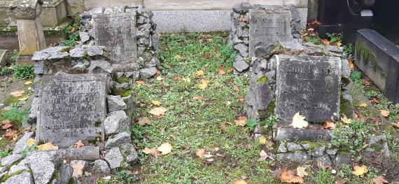 Grave site with several small gravestones