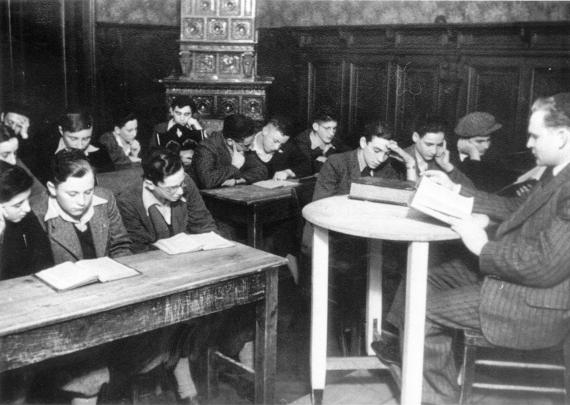 Teachers and pupils in a classroom