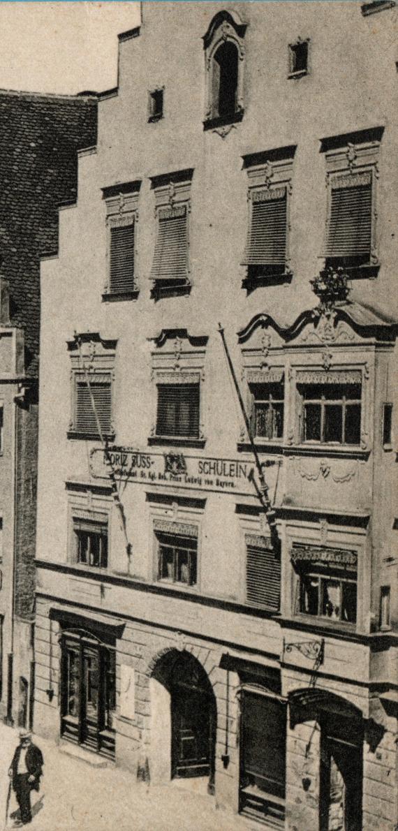 Historical picture postcard Ingolstadt - Theresienstraße with view to the Ob. Stadtpfarrkirche - Hardware store Moriz Süss Schülein - Purveyor to the court of Sr. kgl. Prince Ludwig of Bavaria - Enlargement - Hardware store Moriz Süss Schülein