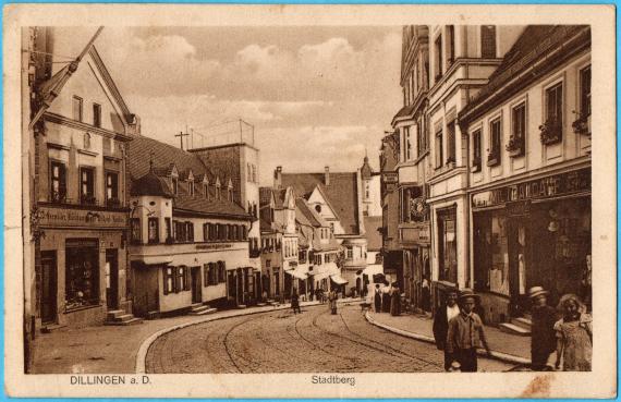 Historical picture postcard - Dillingen a. D. - Stadtberg - with a view of stores and inns - mailed on December 9, 1914