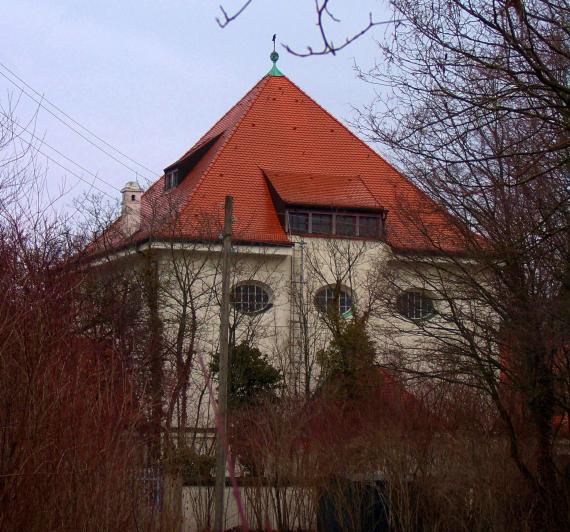 Cemetery building from south with red pointed roof