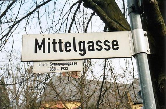 Street and information sign Mittelgasse, former synagogue alley in Nieder-Olm