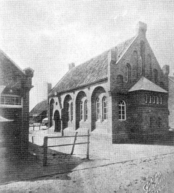 black and white front view of nordic style house with arched windows.