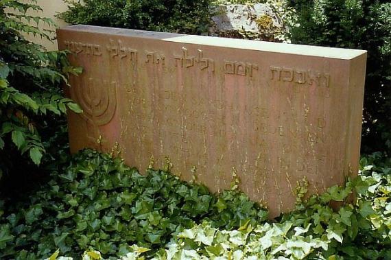 The memorial stone for the former synagogue in Sandhausen, erected in 1961 and now barely legible