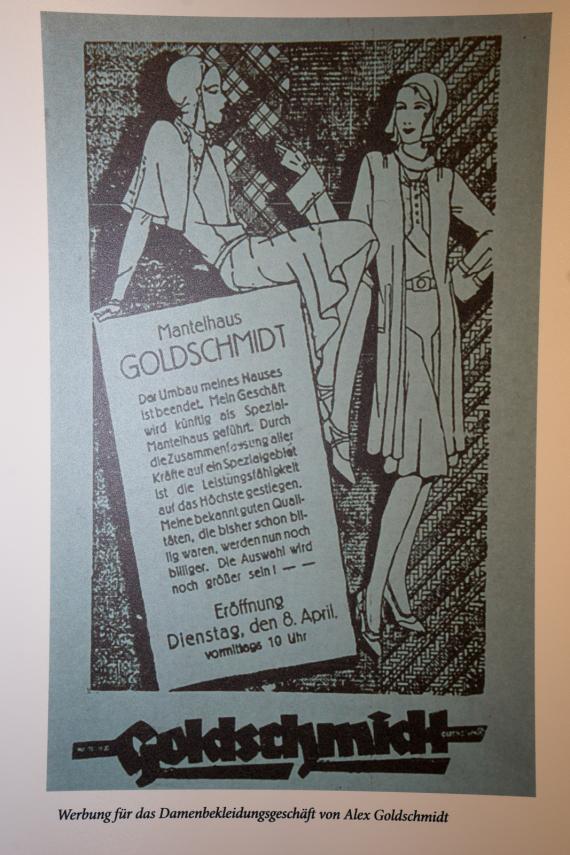 Photography of an advertising poster for the new opening of the coat store Goldschmidt