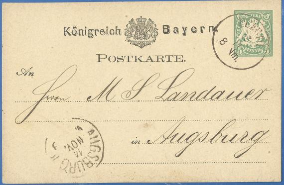 Postcard of business nature to M. S. Landauer, sent on November 13, 1877. Below the upper edge of the card is printed Kingdom of Bavaria.
Between the two words is inserted a shield-shaped coat of arms held by two crowned lions. In the top right corner of the card, the stamp ( postage stamp) 5 Pfennig is imprinted in green. The stamp is cancelled with a round postmark of Fürth. In the lower left corner is still the Augsburg postal arrival cancel of November 14.