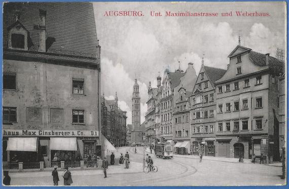 Die Untere Maximilianstraße und Weberhaus mit dem Modewarengeschäft Max Ginsberger & Co. auf einer historischen Ansichtskarte um 1915